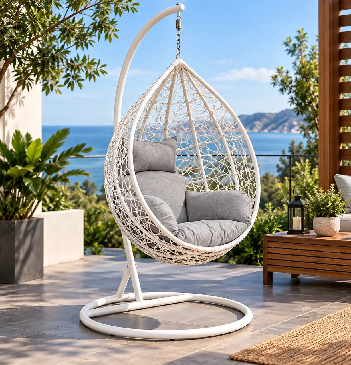Rattan hanging single rocking chair for court yard